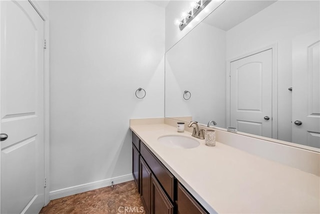 15448 Six M Ranch Ln, Fontana, CA 92336 - bathroom with vanity and baseboards