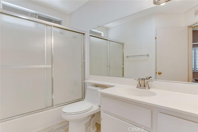 5575 Osborne Ct, San Bernardino, CA 92407 - bathroom with vanity and bath / shower combo with glass door