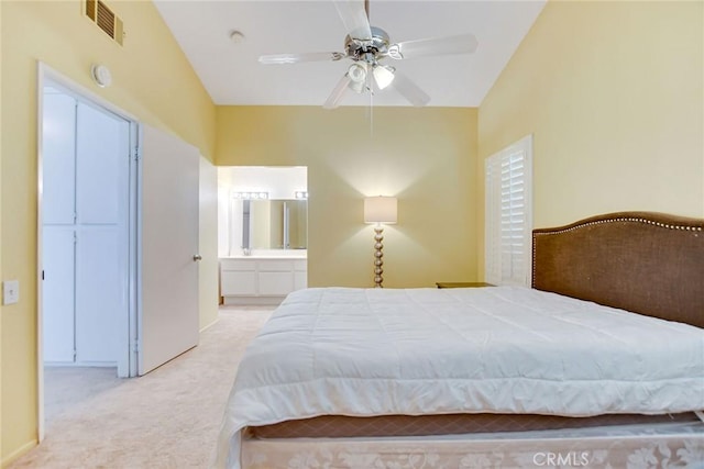 5575 Osborne Ct, San Bernardino, CA 92407 - bedroom with carpet, connected bathroom, lofted ceiling, and ceiling fan