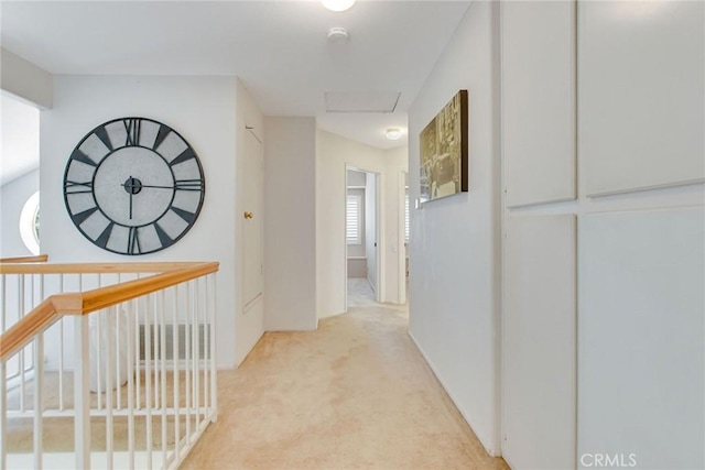 5575 Osborne Ct, San Bernardino, CA 92407 - corridor featuring light carpet, an upstairs landing, and attic access
