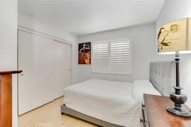 5575 Osborne Ct, San Bernardino, CA 92407 - bedroom featuring wood finished floors and a closet