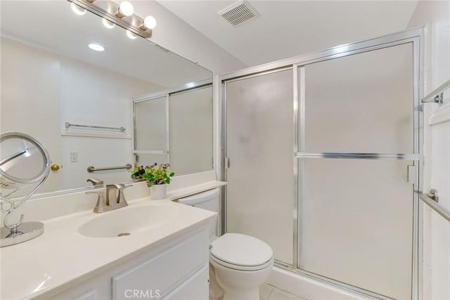 5575 Osborne Ct, San Bernardino, CA 92407 - bathroom with vanity, a shower with door, and tile patterned flooring