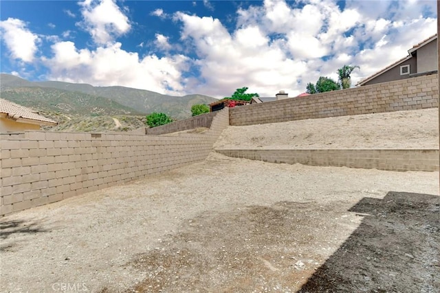 5575 Osborne Ct, San Bernardino, CA 92407 - fenced backyard with a mountain view