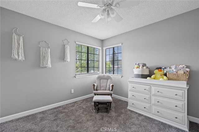 7209 Copper Creek Way, Bakersfield, CA 93308 - sitting room featuring a textured ceiling, a ceiling fan, and dark carpet