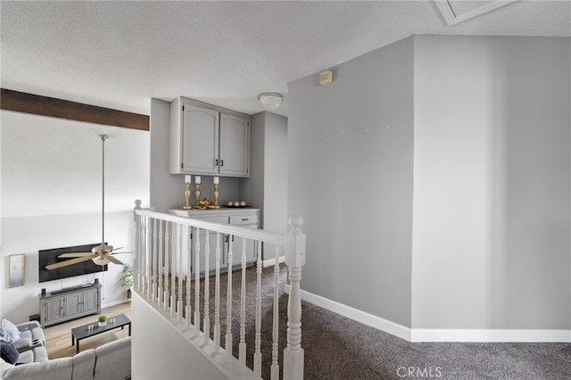 7209 Copper Creek Way, Bakersfield, CA 93308 - staircase featuring a textured ceiling, ceiling fan, and carpet floors
