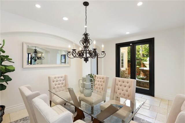 41 Balcony, Irvine, CA 92603 - dining space with a chandelier, recessed lighting, french doors, and stone tile flooring