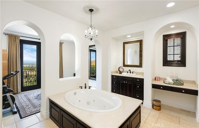 41 Balcony, Irvine, CA 92603 - full bathroom featuring a tub with jets, vanity, and recessed lighting