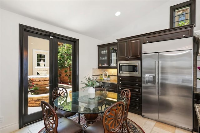 41 Balcony, Irvine, CA 92603 - dining space featuring light tile patterned flooring, vaulted ceiling, and recessed lighting
