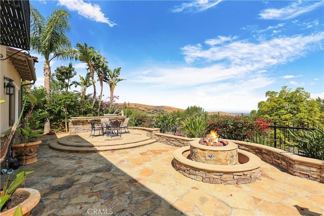 41 Balcony, Irvine, CA 92603 - view of patio / terrace with an outdoor fire pit and outdoor dining area