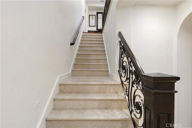 41 Balcony, Irvine, CA 92603 - stairs featuring arched walkways and baseboards