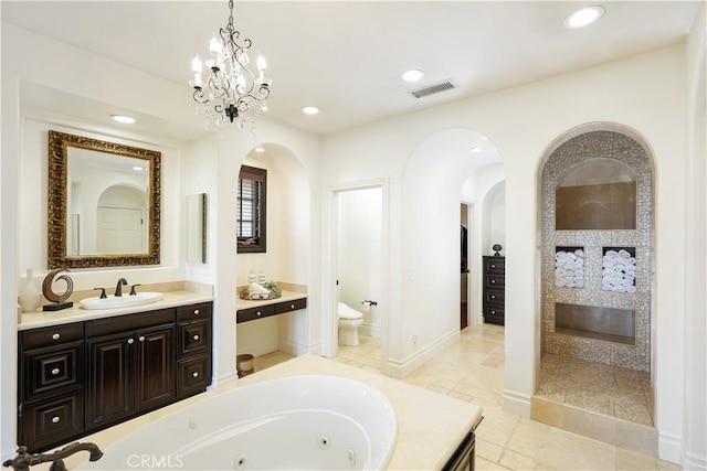 41 Balcony, Irvine, CA 92603 - full bath featuring a jetted tub, vanity, a walk in shower, recessed lighting, and tile patterned floors