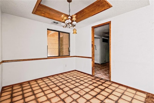 42865 Normandy Ln, Lancaster, CA 93536 - unfurnished room featuring a textured ceiling and a chandelier