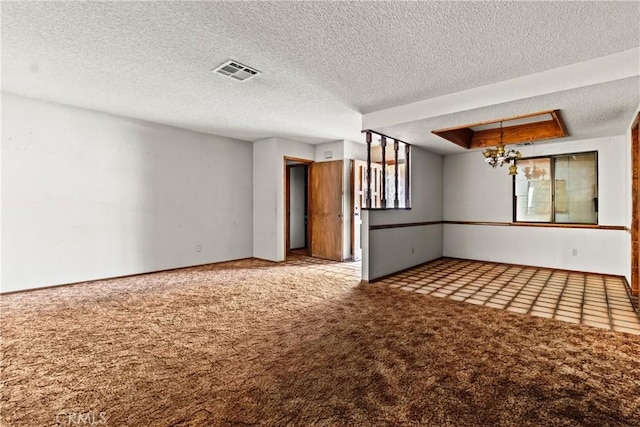 42865 Normandy Ln, Lancaster, CA 93536 - carpeted spare room featuring a chandelier and a textured ceiling