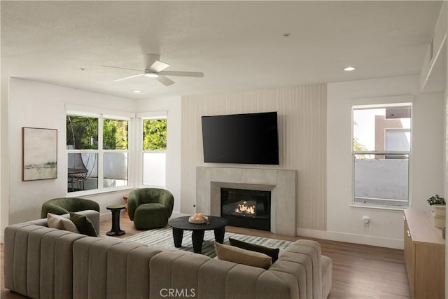 3010 Vina Vial, San Clemente, CA 92673 - living area with wood finished floors, a ceiling fan, a premium fireplace, and recessed lighting