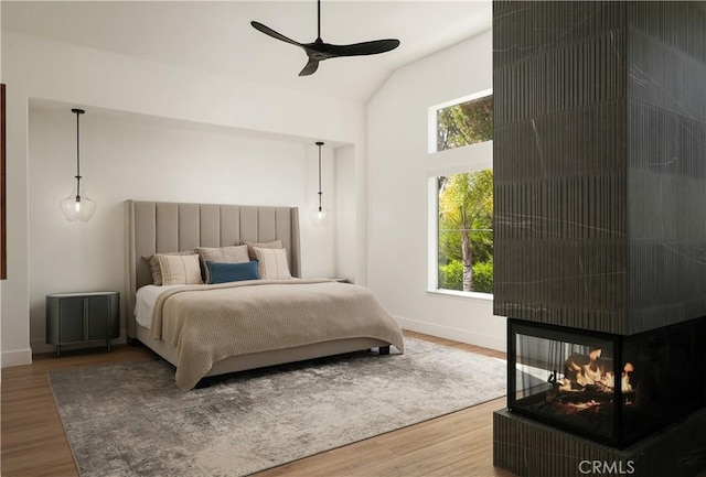3010 Vina Vial, San Clemente, CA 92673 - bedroom with vaulted ceiling, wood finished floors, and a ceiling fan