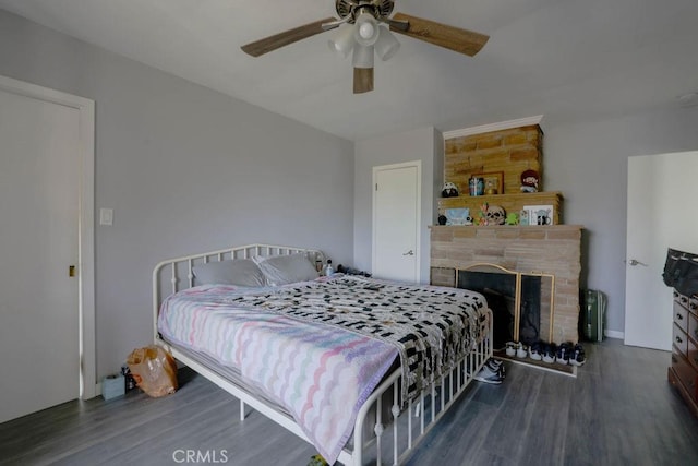 511 Delaware Rd, Burbank, CA 91504 - bedroom with wood finished floors, ceiling fan, and a fireplace