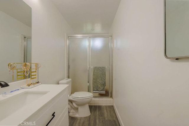 511 Delaware Rd, Burbank, CA 91504 - bathroom featuring wood finished floors, a shower stall, and vanity