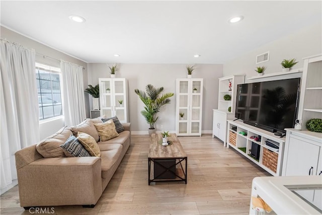 14020 Orizaba Ave Unit 6A, Paramount, CA 90723 - living area featuring light wood-style floors and recessed lighting