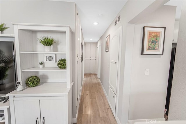 14020 Orizaba Ave Unit 6A, Paramount, CA 90723 - hall with light wood-style floors and recessed lighting