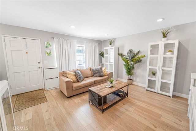 14020 Orizaba Ave Unit 6A, Paramount, CA 90723 - living area with light wood finished floors and recessed lighting