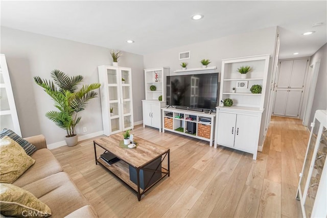 14020 Orizaba Ave Unit 6A, Paramount, CA 90723 - living area with light wood-style flooring and recessed lighting