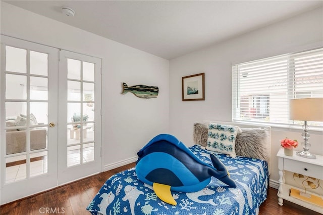 7065 Seawind Dr, Long Beach, CA 90803 - bedroom with french doors, access to outside, and wood finished floors