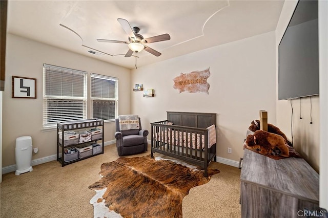 1968 Bancroft Dr, Chico, CA 95928 - bedroom featuring carpet floors, a nursery area, and a ceiling fan