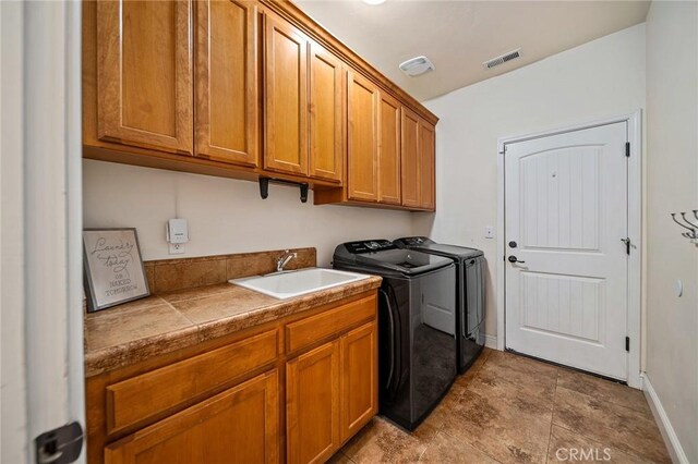 1968 Bancroft Dr, Chico, CA 95928 - laundry area with cabinet space and washing machine and dryer