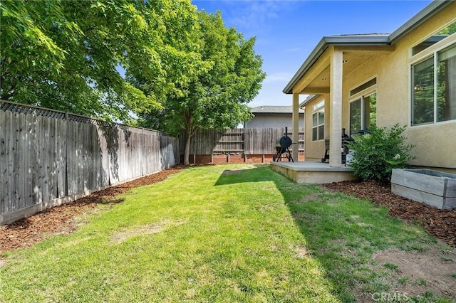 1968 Bancroft Dr, Chico, CA 95928 - fenced backyard with a patio area