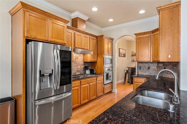 1968 Bancroft Dr, Chico, CA 95928 - kitchen with stainless steel appliances, decorative backsplash, ornamental molding, recessed lighting, and under cabinet range hood