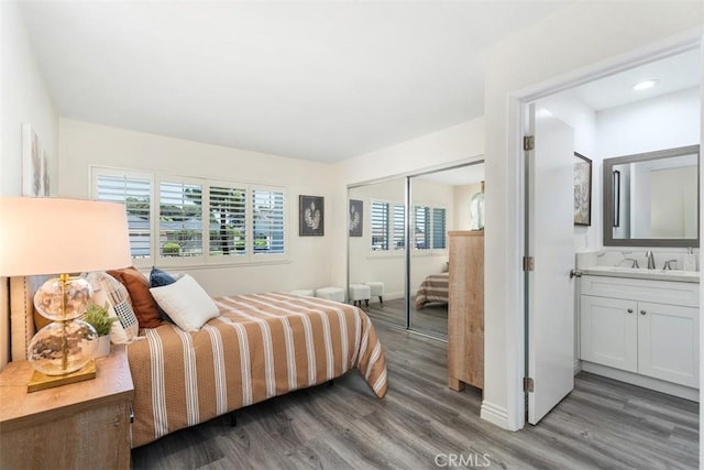 3125 Yukon Ave, Costa Mesa, CA 92626 - bedroom with a closet, wood finished floors, and connected bathroom
