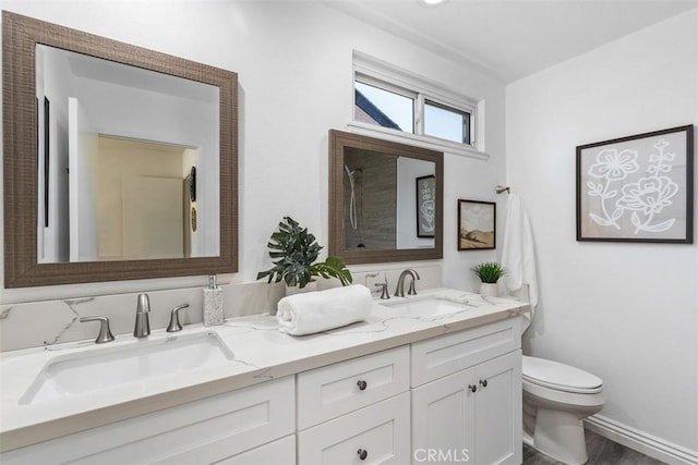 3125 Yukon Ave, Costa Mesa, CA 92626 - full bathroom featuring double vanity, a shower, and wood finished floors