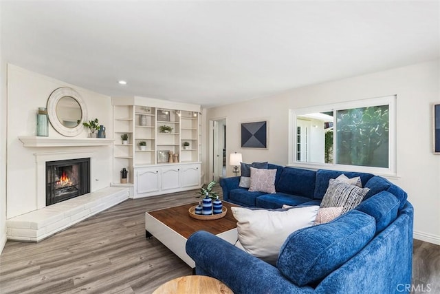 3125 Yukon Ave, Costa Mesa, CA 92626 - living room featuring dark wood-style floors, a fireplace, and recessed lighting