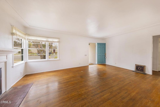 237 N Katherine Dr, Ventura, CA 93003 - unfurnished living room featuring wood finished floors, a fireplace with flush hearth, and heating unit