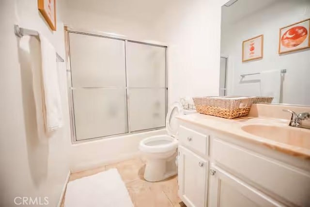 30319 Desert Moon Dr, Thousand Palms, CA 92276 - bathroom featuring vanity, shower / bath combination with glass door, and tile patterned flooring