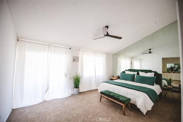 30319 Desert Moon Dr, Thousand Palms, CA 92276 - carpeted bedroom with vaulted ceiling and a ceiling fan