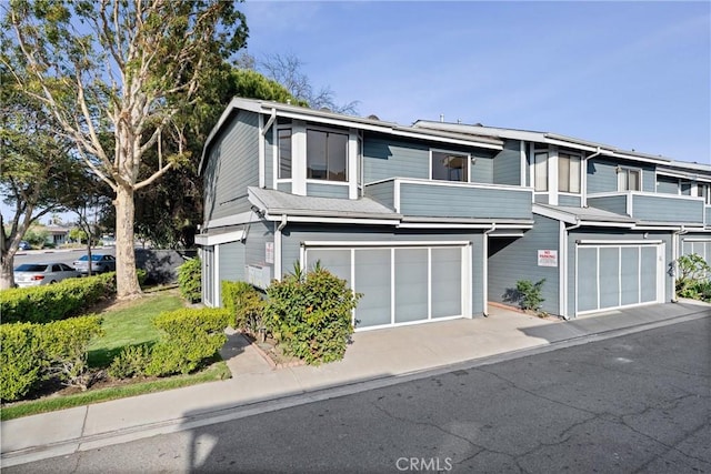 1262 E Ln Palma Ave Unit A, Anaheim, CA 92805 - view of property with an attached garage