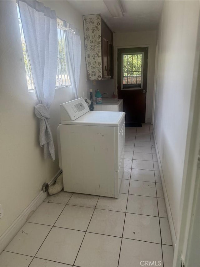 119 W Francis St, Corona, CA 92882 - laundry area featuring light tile patterned flooring and baseboards