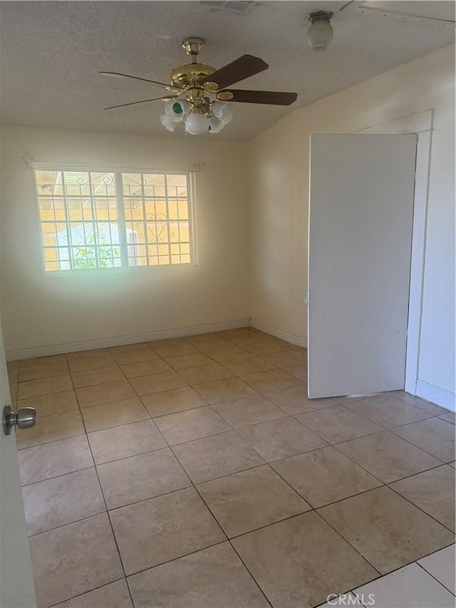 119 W Francis St, Corona, CA 92882 - unfurnished room featuring ceiling fan, light tile patterned floors, and lofted ceiling
