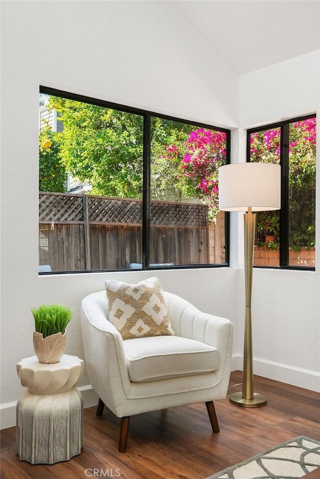 24511 Sutton Ln, Laguna Niguel, CA 92677 - living area featuring wood finished floors and lofted ceiling