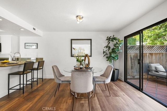 24511 Sutton Ln, Laguna Niguel, CA 92677 - dining area with wood finished floors and recessed lighting
