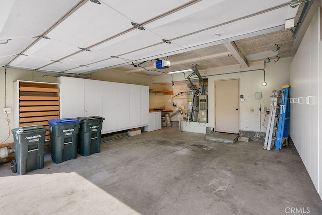 24511 Sutton Ln, Laguna Niguel, CA 92677 - garage with a garage door opener and secured water heater
