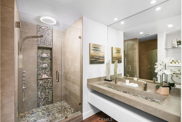24511 Sutton Ln, Laguna Niguel, CA 92677 - bathroom featuring vanity, a stall shower, and recessed lighting