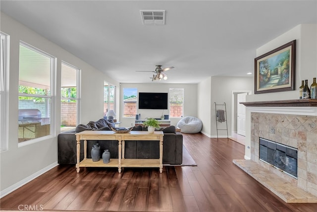 1775 Honors Ln, Corona, CA 92883 - living area featuring dark wood finished floors, a fireplace, and a ceiling fan