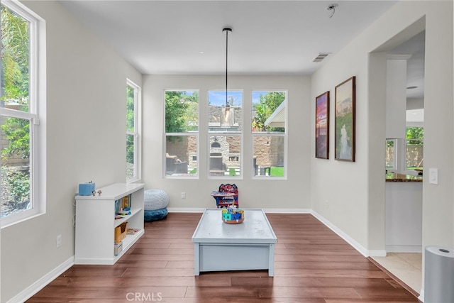 1775 Honors Ln, Corona, CA 92883 - living area with wood finished floors and healthy amount of natural light