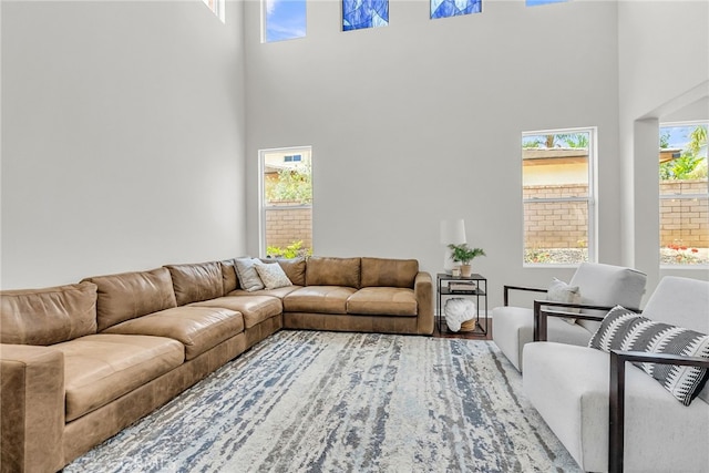 1775 Honors Ln, Corona, CA 92883 - living area featuring a towering ceiling and healthy amount of natural light