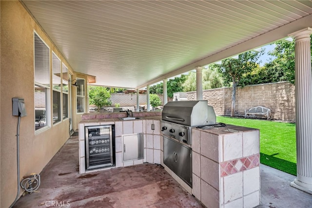 1775 Honors Ln, Corona, CA 92883 - fenced backyard with beverage cooler, area for grilling, and a patio