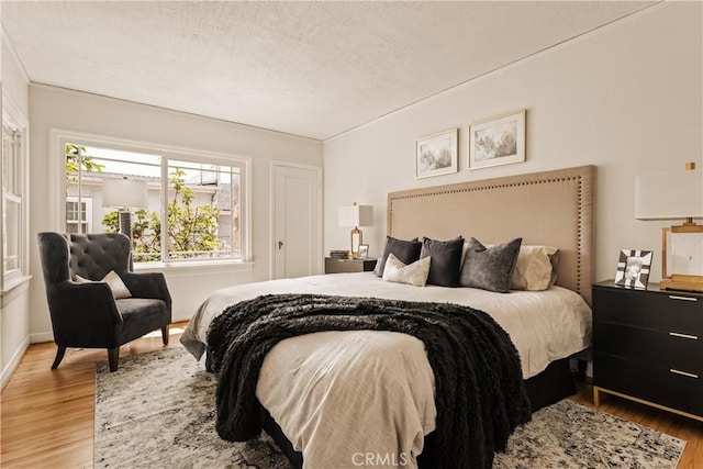 3848 Boyce Ave, Los Angeles, CA 90039 - bedroom featuring wood finished floors and a textured ceiling