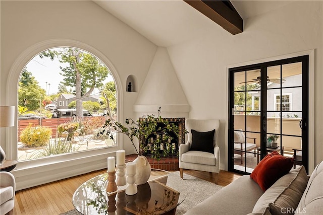 3848 Boyce Ave, Los Angeles, CA 90039 - sitting room with vaulted ceiling and wood finished floors