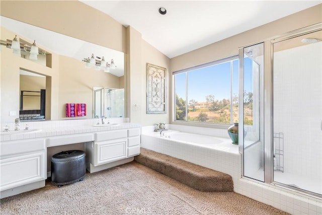100 Stoney, Laguna Niguel, CA 92677 - full bathroom with vaulted ceiling, a stall shower, double vanity, and a garden tub